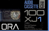 Compact Cassette:  Ora - XJ1 100